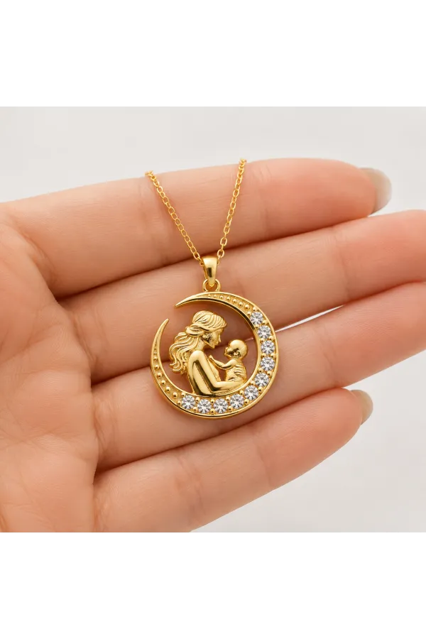 Gümüş Hilal İçinde Anne Bebek Figürlü Gold Kolye Gümüş Hilal İçinde Anne Bebek Figürlü Gold Kolye
