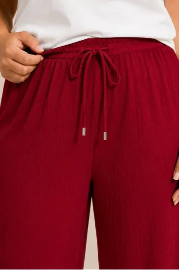 Kadın Battal Beden Bürümcük Kumaş Beli Lastikli Bağcıklı Bol Paça Palazzo Pantolon - Bordo Kadın Battal Beden Bürümcük Kumaş Beli Lastikli Bağcıklı Bol Paça Palazzo Pantolon - Bordo